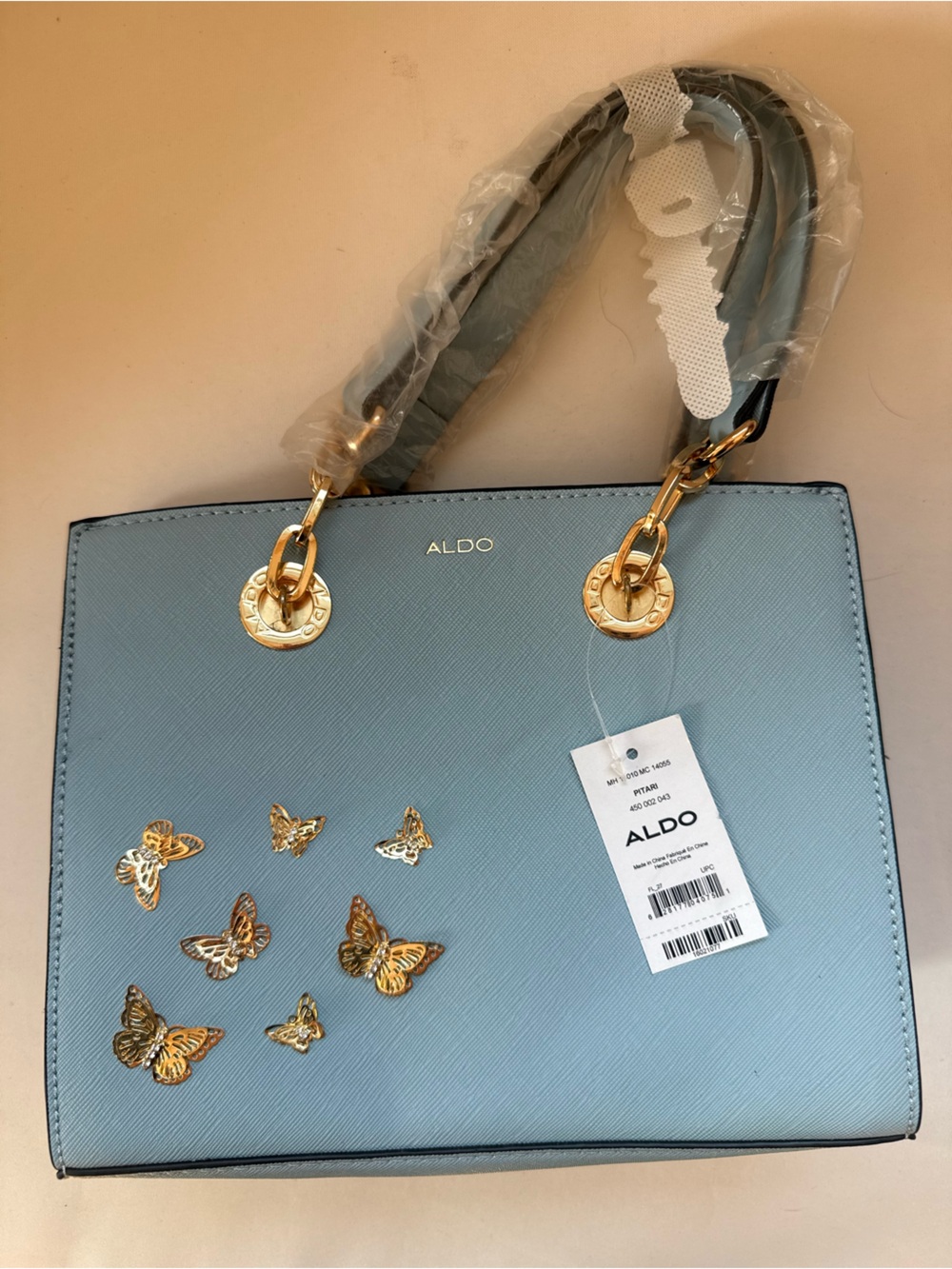 ALDO Light Blue Satchel with Gold Butterfly Accents